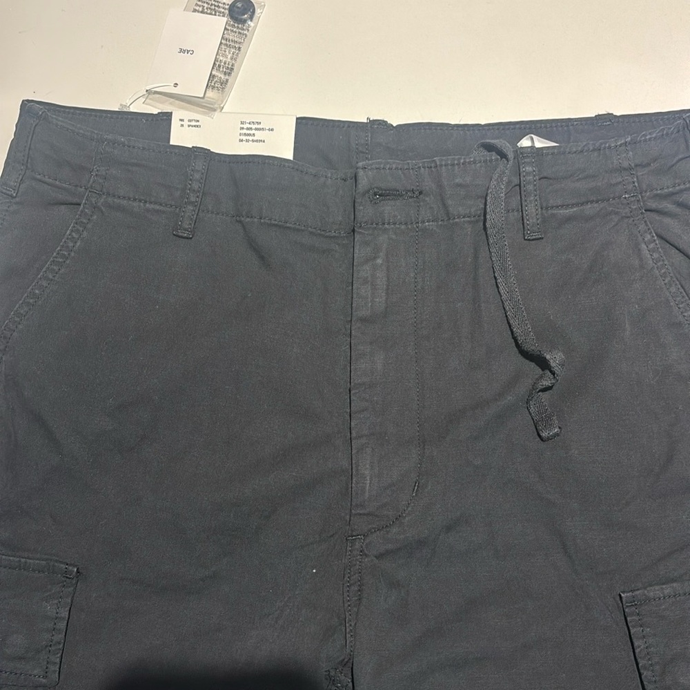 Uniqlo black cargo pants. New with tags.